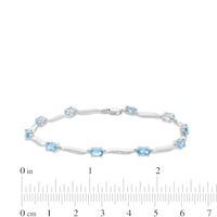 Oval Swiss Blue Topaz and Diamond Accent Wave Link Bracelet in Sterling Silver - 7.25"|Peoples Jewellers