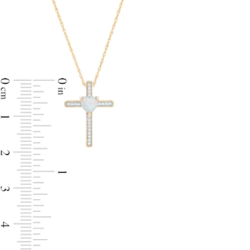 5.0mm Heart-Shaped Lab-Created Opal and 0.05 CT. T.W. Diamond Vintage-Style Cross Pendant in 10K Gold|Peoples Jewellers