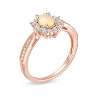 Oval Opal and 0.10 CT. T.W. Diamond Sunburst Frame Vintage-Style Tapered Shank Ring in 10K Rose Gold|Peoples Jewellers