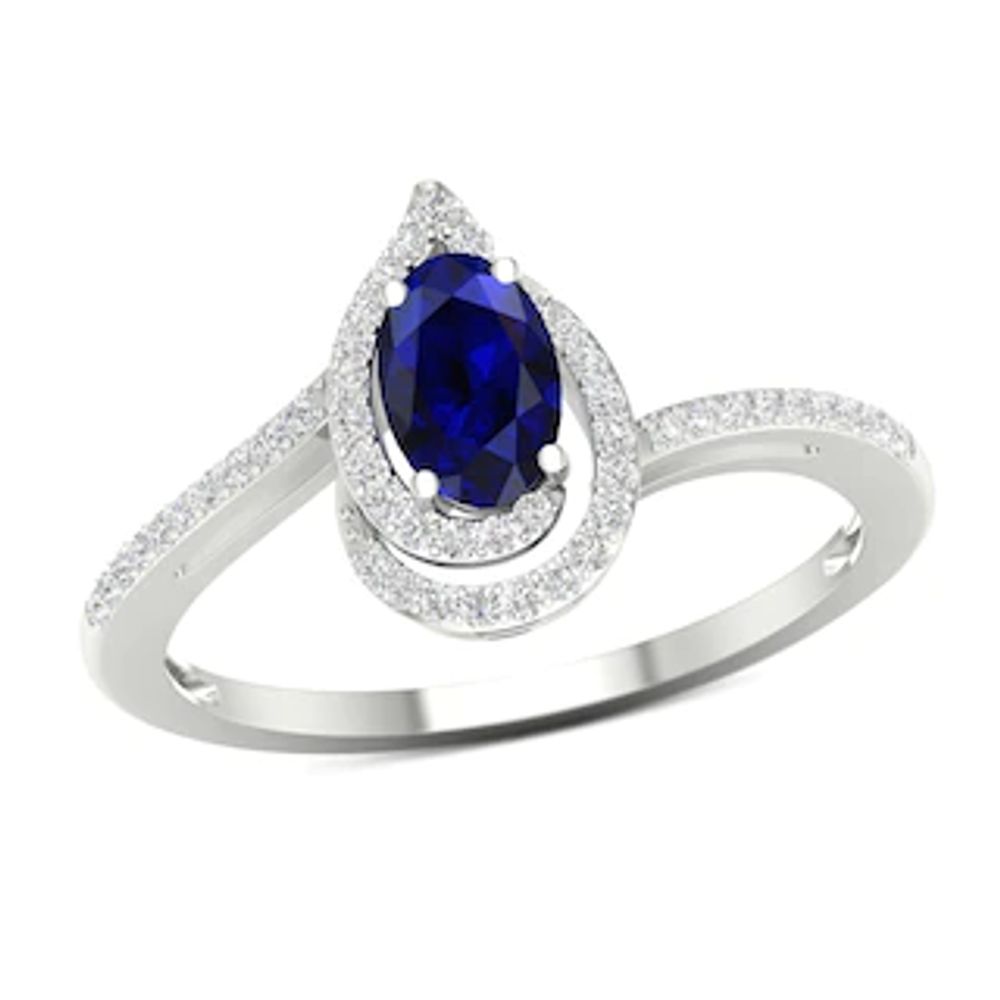 Oval Blue Sapphire and 0.10 CT. T.W. Diamond Flame Spiral Frame Ring in 10K White Gold|Peoples Jewellers