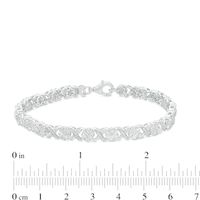 0.23 CT. T.W. Diamond Floral "XO" Link Bracelet in Sterling Silver - 7.25"|Peoples Jewellers