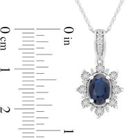 Oval Blue Sapphire and 0.08 CT. T.W. Diamond Sunburst Frame Vintage-Style Drop Pendant in 10K White Gold|Peoples Jewellers