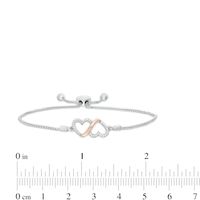 0.10 CT. T.W. Diamond Double Heart Loop Bolo Bracelet in Sterling Silver and 10K Rose Gold - 9.50"|Peoples Jewellers