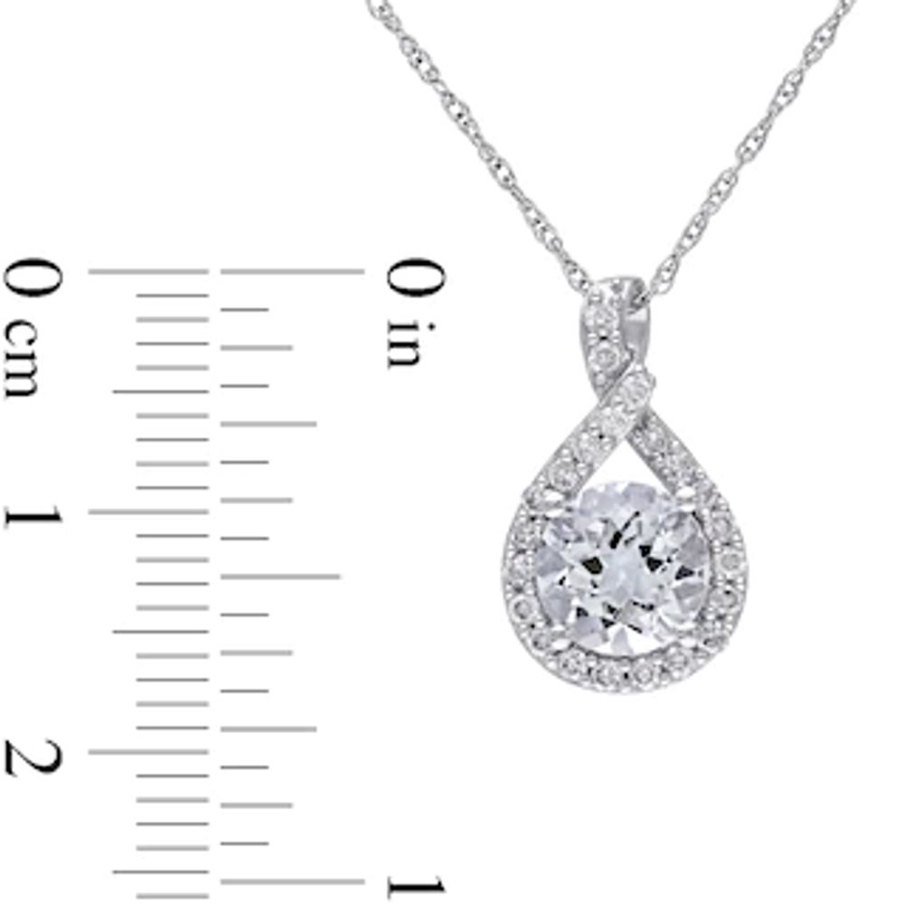 7.0mm Aquamarine and 0.22 CT. T.W. Diamond Twisted Teardrop Pendant in 10K White Gold - 17"|Peoples Jewellers