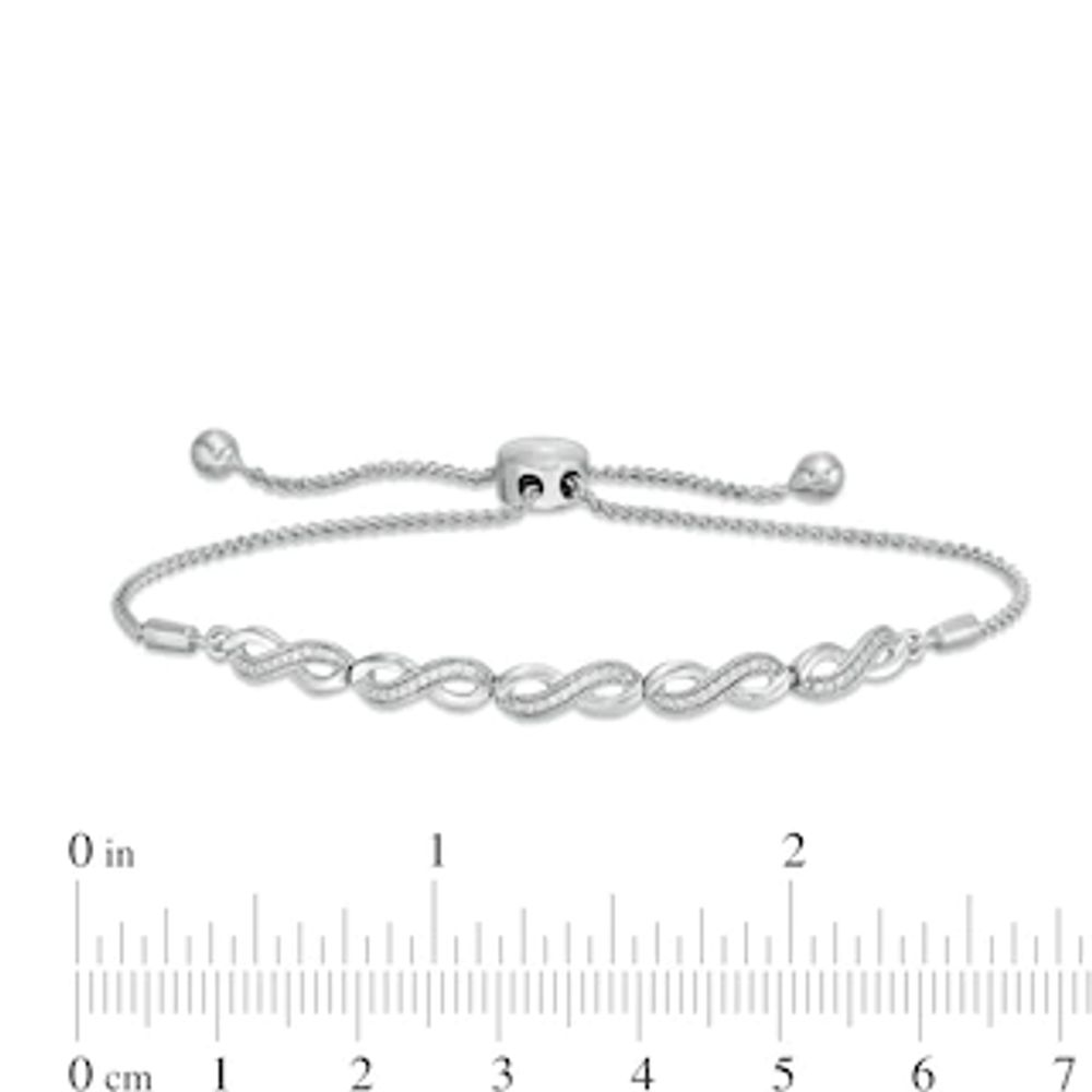 0.09 CT. T.W. Diamond Vintage-Style Infinity Bolo Bracelet in Sterling Silver - 9.5"|Peoples Jewellers