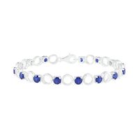 4.5mm Lab-Created Blue Sapphire and 0.18 CT. T.W. Diamond Open Circle Link Line Bracelet in Sterling Silver - 7.25"|Peoples Jewellers