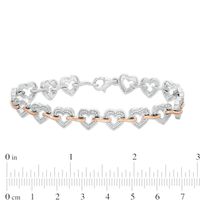 0.10 CT. T.W. Diamond Hearts Bracelet in Sterling Silver and 10K Rose Gold - 7.5"|Peoples Jewellers