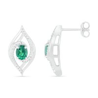 Lab-Created Oval Emerald and 0.067 CT. T.W. Diamond Bypass Flame Stud Earrings in Sterling Silver|Peoples Jewellers