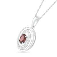 Oval Garnet and 0.065 CT. T.W. Diamond Beaded Open Swirl Frame Drop Pendant in Sterling Silver|Peoples Jewellers