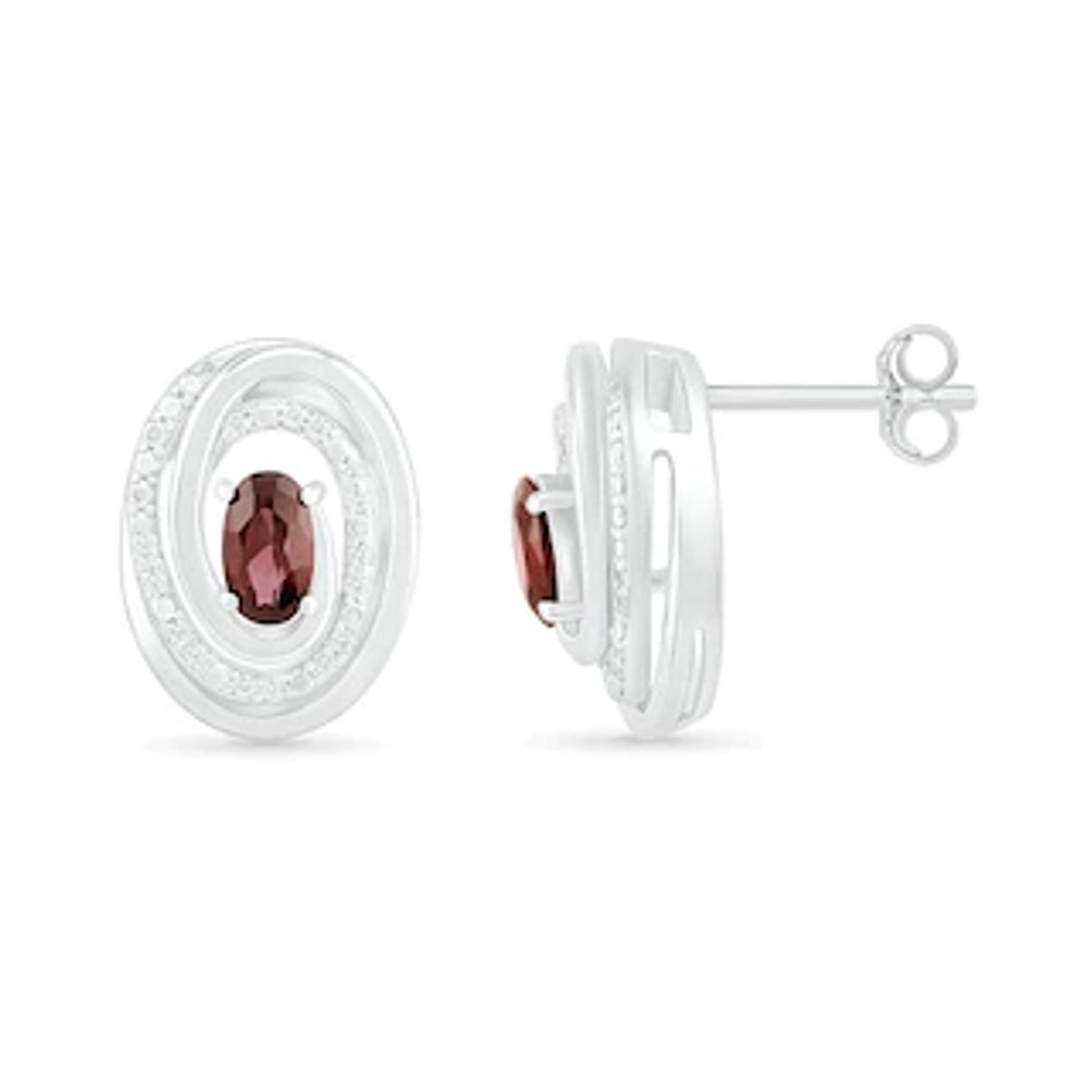 Oval Garnet and 0.066 CT. T.W. Diamond Beaded Open Swirl Frame Stud Earrings in Sterling Silver|Peoples Jewellers