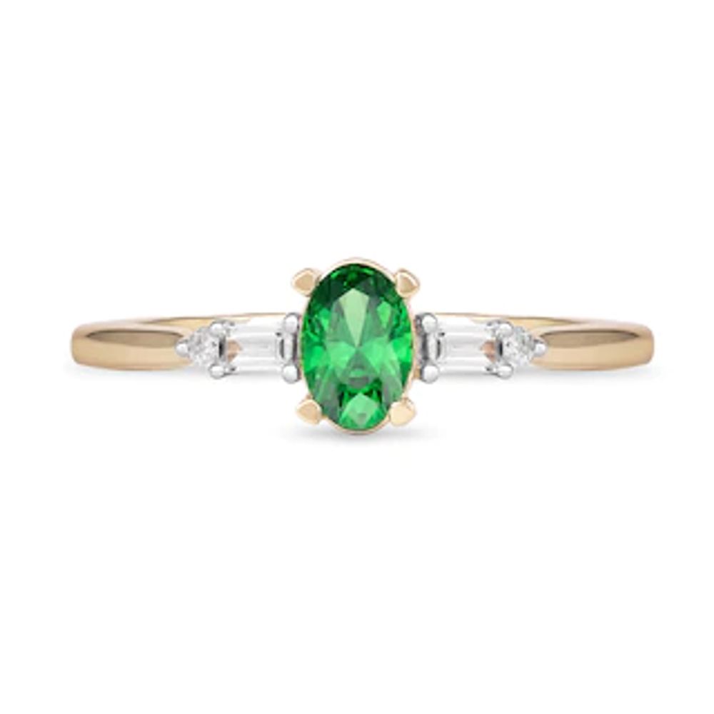 Oval Emerald and 0.10 CT. T.W. Baguette and Round Diamond Side Accent Ring in 10K Gold|Peoples Jewellers