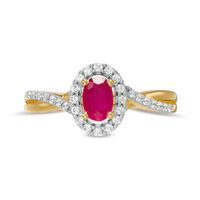 Oval Ruby and 0.20 CT. T.W. Diamond Frame Twisted Bypass Split Shank Ring in 10K Gold|Peoples Jewellers