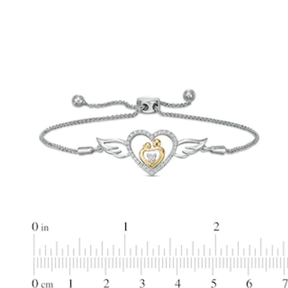 0.086 CT. T.W. Diamond Winged Heart Bolo Bracelet in Sterling Silver and 10K Gold – 9.5"|Peoples Jewellers