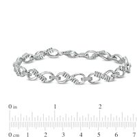 0.04 CT. T.W. Diamond "mom" Infinity Loop Bracelet in Sterling Silver – 7.5"|Peoples Jewellers