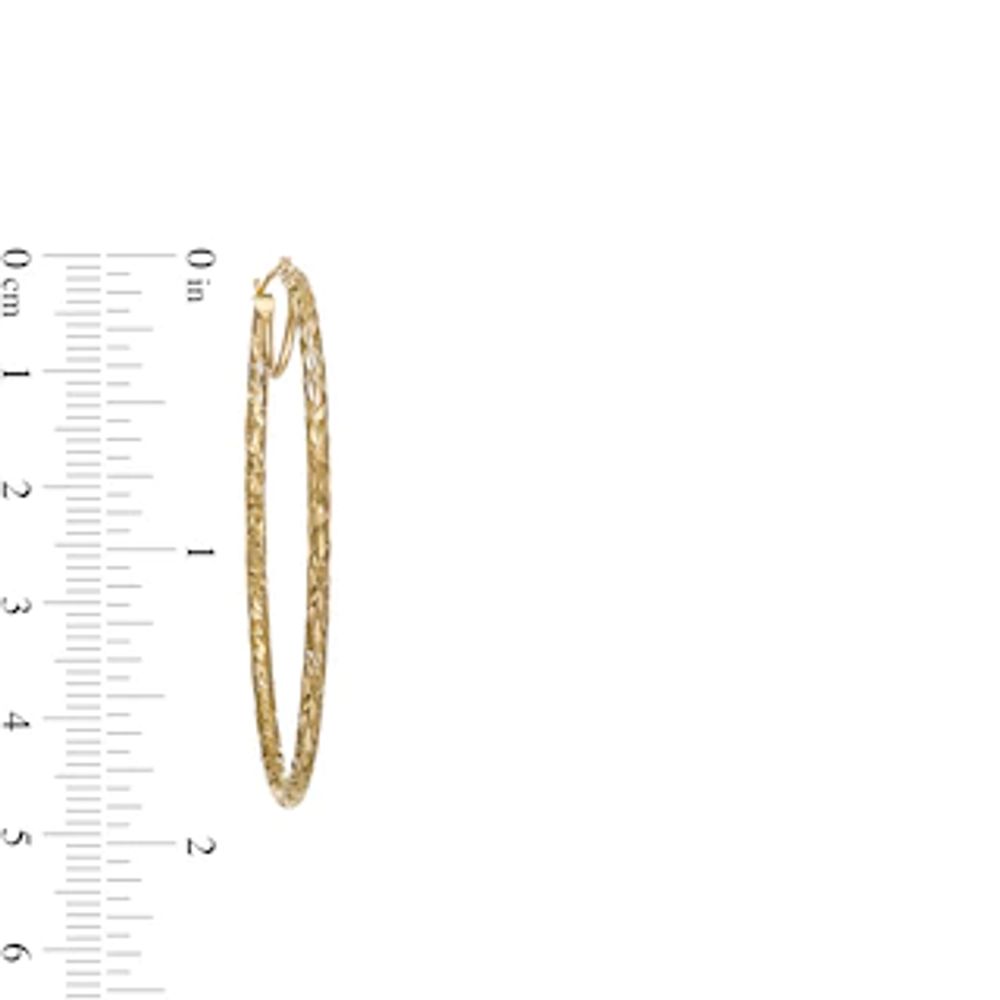 50.0mm Diamond-Cut Inside-Out Tube Oval Hoop Earrings in 14K Gold|Peoples Jewellers