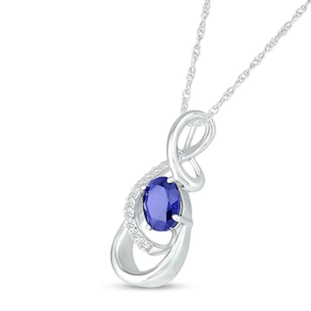 Oval Blue and White Lab-Created Sapphire Infinity Ribbon Overlay Pendant in Sterling Silver|Peoples Jewellers