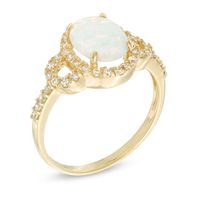 Previously Owned - Oval Lab-Created Opal and White Sapphire Buckle Frame Ring in 10K Gold|Peoples Jewellers