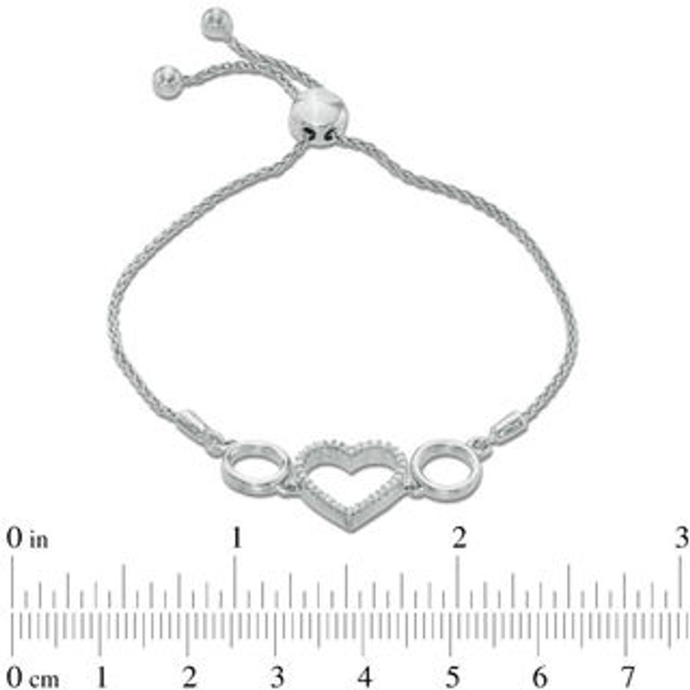 Previously Owned - 0.10 CT. T.W. Diamond Heart Station Bolo Bracelet in Sterling Silver - 9.5"|Peoples Jewellers