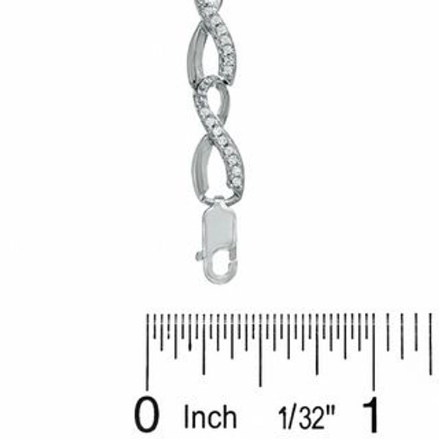 Previously Owned - 0.50 CT. T.W. Diamond Infinity Loop Bracelet in Sterling Silver|Peoples Jewellers