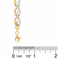 Previously Owned - Swirl Stampato Bracelet in 10K Two-Tone Gold - 7.25"|Peoples Jewellers