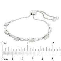 Previously Owned - 0.05 CT. T.W. Diamond Two-Stone Infinity Bolo Bracelet in Sterling Silver