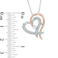 Previously Owned - 0.18 CT. T.W.   Diamond Heart Pendant in Sterling Silver and 10K Rose Gold (I/I2)|Peoples Jewellers