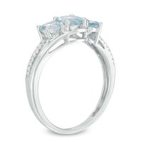 Previously Owned - Aquamarine and 0.04 CT. T.W. Diamond Three Stone Bypass Ring in 10K White Gold|Peoples Jewellers
