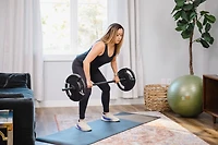 The Step Fitness Adjustable 60 lb Barbell Weight Set