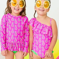 RuffleButts Girls' 4-7 Neon Violet Pineapples One Shoulder Ruffle Swimsuit