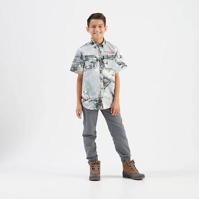 Magellan Outdoors Boys' Laguna Madre Holiday Mossy Oak Break-Up Country Snowdrift 2.0 Fishing Shirt