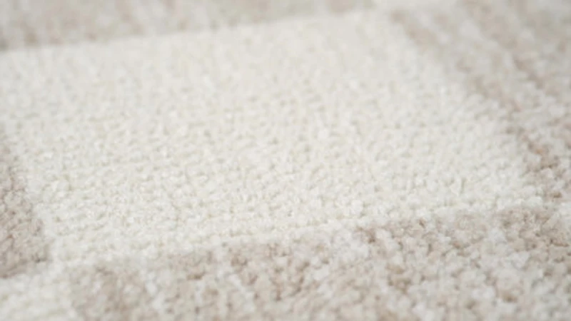 Leela Ivory Textured Wave Design Area Rug