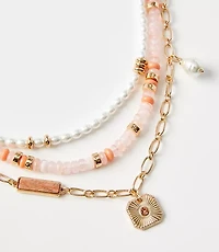 Pearlized Layered Charm Statement Necklace