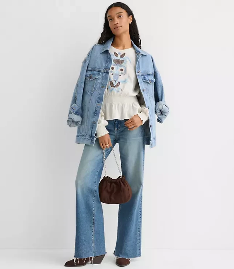Embroidered Smocked Peplum Blouse
