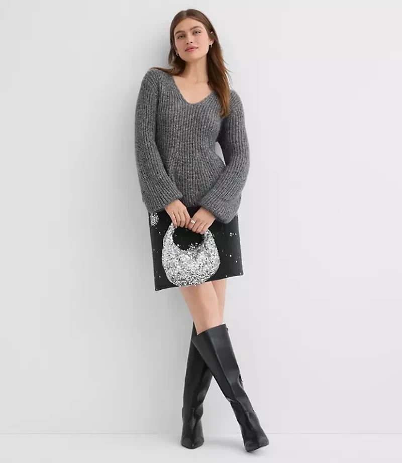 Shimmer Ribbed Peplum Sweater