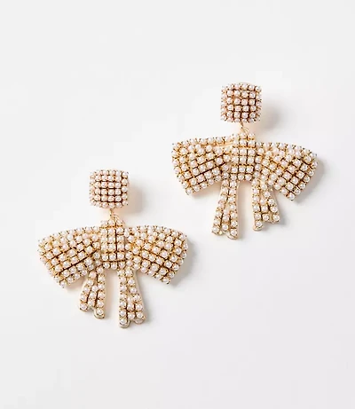 Pearlized Bow Statement Earrings