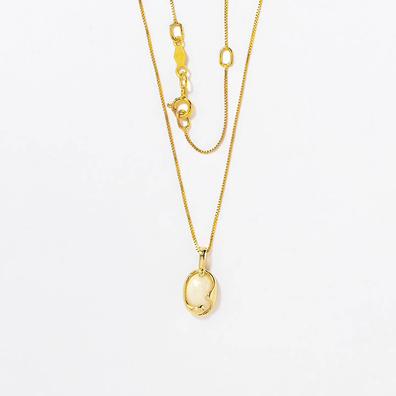 Oval Opal Pendant Crafted In 10K Yellow Gold
