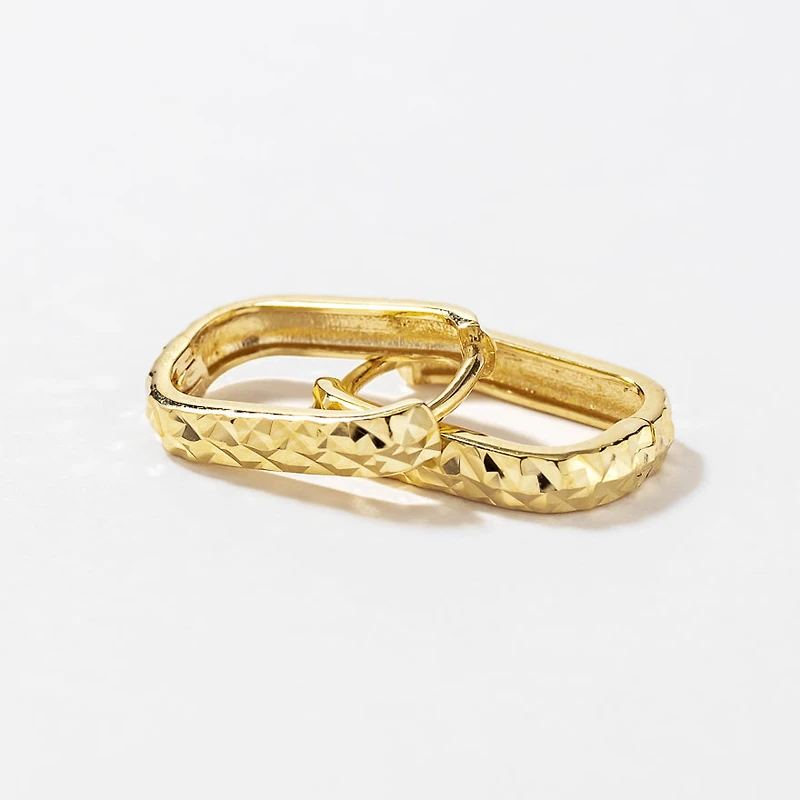 Diamond Cut Oval Huggie Earrings in 10K Yellow Gold