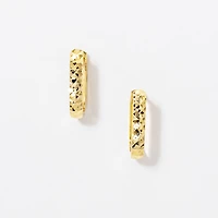 Diamond Cut Oval Huggie Earrings in 10K Yellow Gold