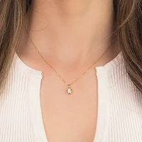Oval Opal Pendant Crafted In 10K Yellow Gold