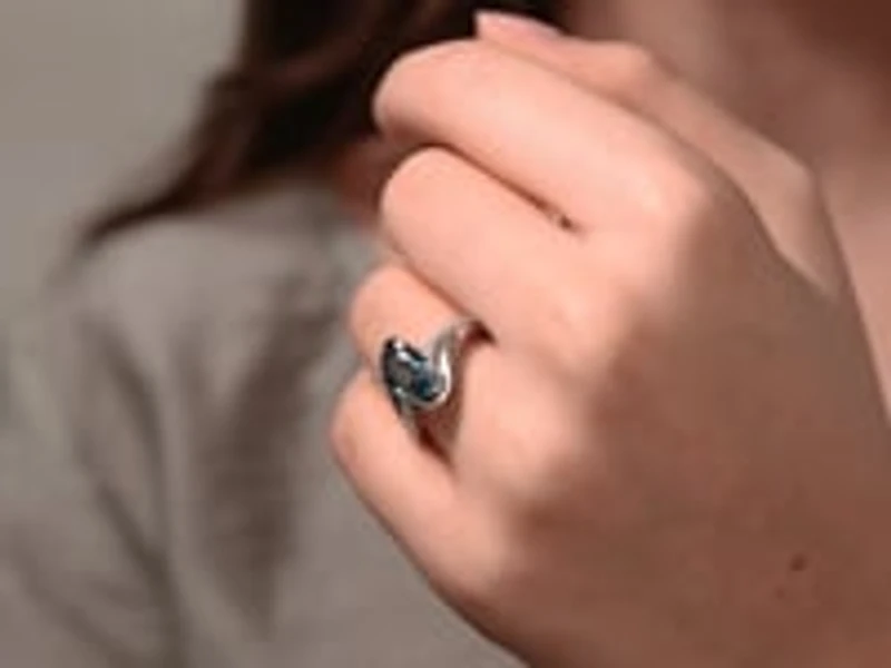 Oval Blue Topaz Ring With Diamond Accents 10K White Gold
