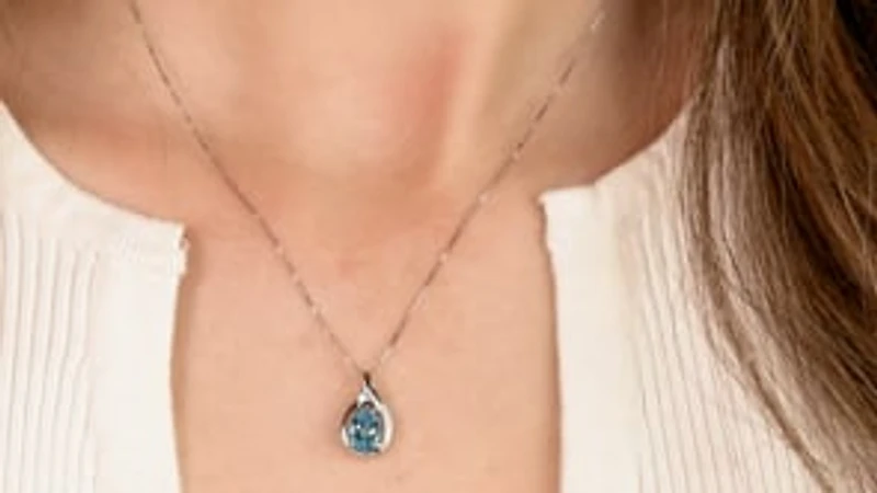 Diamond and Blue Topaz Pendant in 10K White Gold