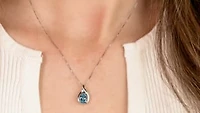 Diamond and Blue Topaz Pendant in 10K White Gold