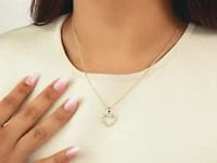 Open Heart Braided Pendant in 10K Yellow Gold