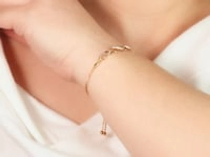 Infinity Bolo Style Bracelet in 10K Yellow Gold (0.05 ct tw)