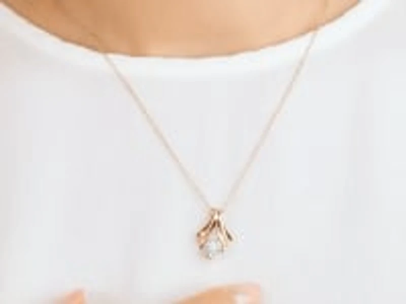 Diamond Cluster Necklace in 10K Yellow and White Gold (0.06 ct tw)