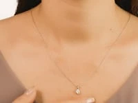 Crescent Set Lab Grown Diamond Solitaire Necklace in 14K Yellow Gold