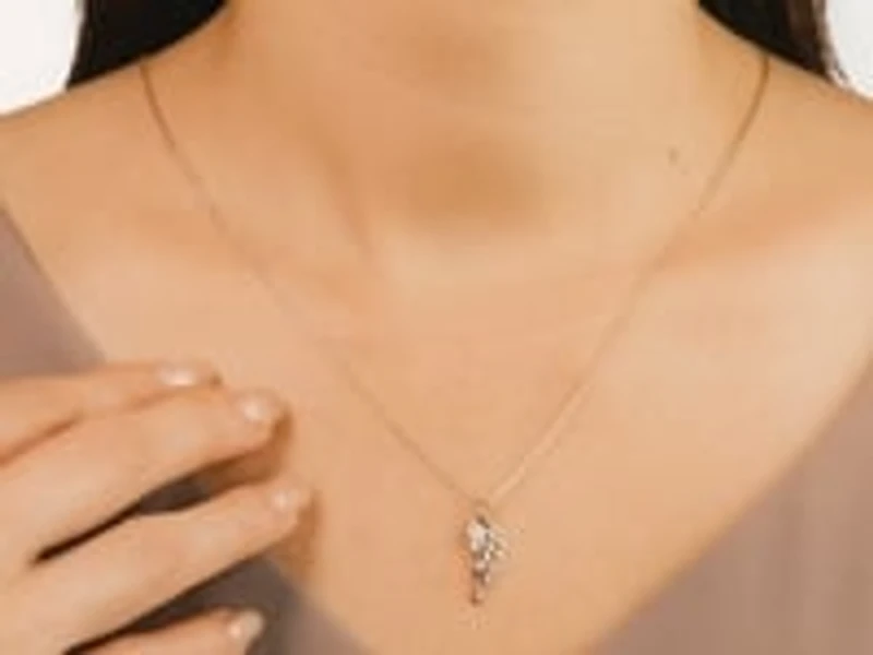 Diamond Angel Wing Necklace in 10K Yellow Gold (0.02 ct tw)