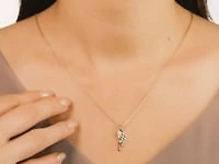 Diamond Angel Wing Necklace in 10K Yellow Gold (0.02 ct tw)