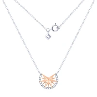 10K White and Rose Gold Diamond Cluster Star Pendant (0.16 ct tw)