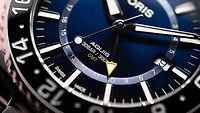 Aquis GMT Date